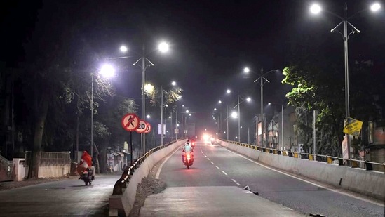 A city street wears a deserted look during night curfew, imposed by authorites amid a surge in coronavirus cases across the country, in Amravati, Maharashtra. (PTI) A city street wears a deserted look during night curfew, imposed by authorites amid a surge in coronavirus cases across the country, in Amravati, Maharashtra. (PTI)