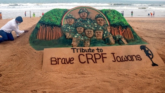 Sand artist Sudarsan Pattnaik creates a sand sculpture as tribute to CRPF jawans killed in Chhattisgarh Maoist attack, at Puri beach of Odisha on Sunday.(PTI Photo) Sand artist Sudarsan Pattnaik creates a sand sculpture as tribute to CRPF jawans killed in Chhattisgarh Maoist attack, at Puri beach of Odisha on Sunday.(PTI Photo)