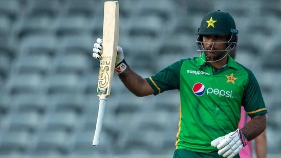 Pakistan's batsman Fakhar Zaman raises his bat to celebrate a century during the 2nd ODI against South Afrcia(AP)