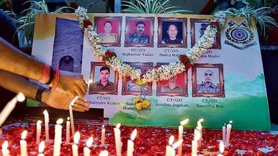 People light candles to pay tribute to the personnel who were killed in the Chhattisgarh gunfight, in Bengaluru on Monday.(PTI) People light candles to pay tribute to the personnel who were killed in the Chhattisgarh gunfight, in Bengaluru on Monday.(PTI)