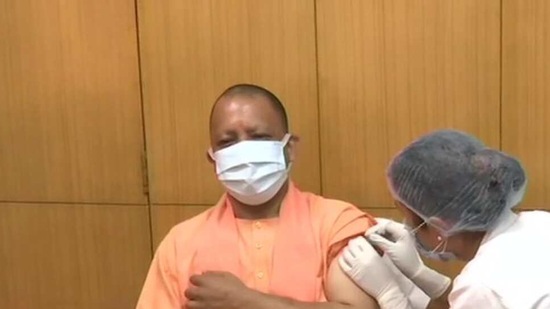 UP CM Yogi Adityanath receiving first dose of Covid-19 vaccine (ANI)