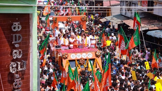 **EDS: TWITTER IMAGE POSTED BY @AmitShah ON THURSDAY, APRIL 1, 2021** Puducherry: Union Home Minister Amit Shah during a roadshow in Puducherry. (PTI Photo)(PTI04_01_2021_000085B)(PTI)