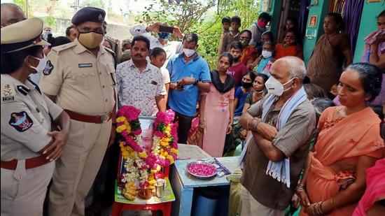 Vizianagaram SP B Rajakumari calling on parents of late CRPF soldier Routhu Jagadish. (HT photo) Vizianagaram SP B Rajakumari calling on parents of late CRPF soldier Routhu Jagadish. (HT photo)