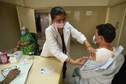 A health worker administers a Covid-19 vaccine, at Sector 30 District Hospital, in Noida. (Sunil Ghosh / Hindustan Times) A health worker administers a Covid-19 vaccine, at Sector 30 District Hospital, in Noida. (Sunil Ghosh / Hindustan Times)