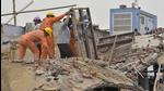 Debris clearing operations on at the roof collapse site in Baba Mukand Singh Nagar of Daba road in Ludhiana on Tuesday. (Gurpreet Singh/HT) Debris clearing operations on at the roof collapse site in Baba Mukand Singh Nagar of Daba road in Ludhiana on Tuesday. (Gurpreet Singh/HT)