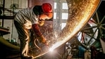 Sparks fly up as a worker produces engineering equipment for export at a factory in Nantong in China's eastern Jiangsu province. (AFP) Sparks fly up as a worker produces engineering equipment for export at a factory in Nantong in China's eastern Jiangsu province. (AFP)