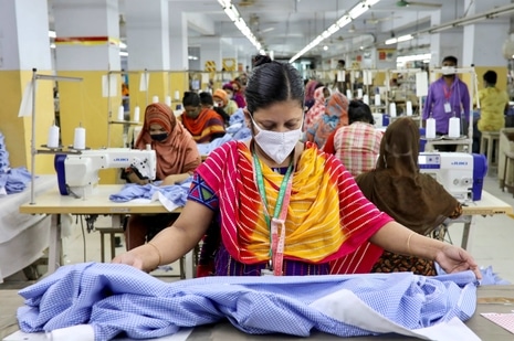 A woman works in a garment factory in Dhaka. (REUTERS) A woman works in a garment factory in Dhaka. (REUTERS)