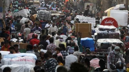 People walk at a crowded market amidst the spread of the coronavirus disease (Covid-19), in the old quarters of Delhi, India, April 6, 2021. (Reuters)