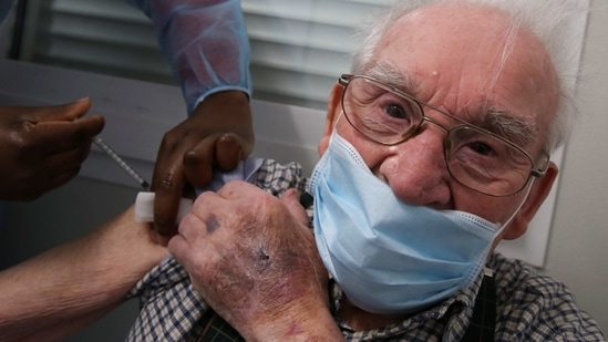 A man receives a dose of AstraZeneca COVID-19 vaccine at a vaccination center, amid the coronavirus disease outbreak, in Ronquieres, Belgium April 6, 2021. REUTERS/Yves Herman(REUTERS)