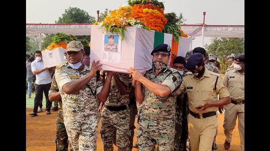 Security forces officers carry the body of a colleague, who was killed in an attack by Maoist fighters, during a wreath laying ceremony, Bijapur, Chhattisgarh, April 5, 2021 (REUTERS)