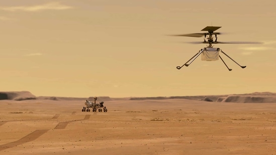 This NASA photo obtained on March 24, 2021 shows an illustration depicting Mars Helicopter Ingenuity during a test flight on Mars. (AFP) This NASA photo obtained on March 24, 2021 shows an illustration depicting Mars Helicopter Ingenuity during a test flight on Mars. (AFP)