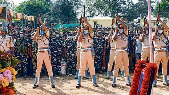 Security personnel pay tribute to a CRPF jawan during his funeral ceremony at Dharmanagar, Tripura, on Tuesday. (PTI Photo)