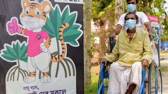 A differently abled voter arrives at a polling station in Basanti assembly constituency of South 24 Parganas District in West Bengal.