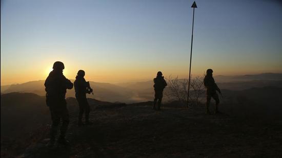 In this file photo, Indian army soldiers patrol along the Line of Control (LOC) between India and Pakistan border. (AP/ Representational image.)