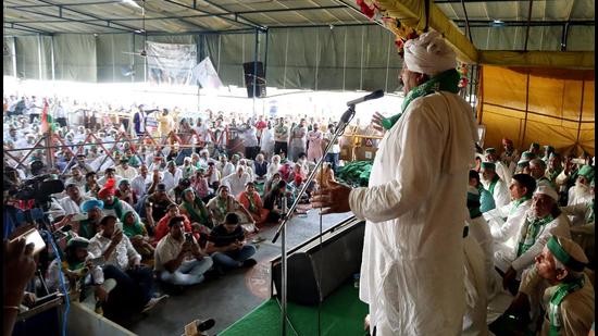 BKU national president Naresh Tikait addresses the Mahapanchayat at Ghazipur border, in New Delhi on Sunday. (ANI)