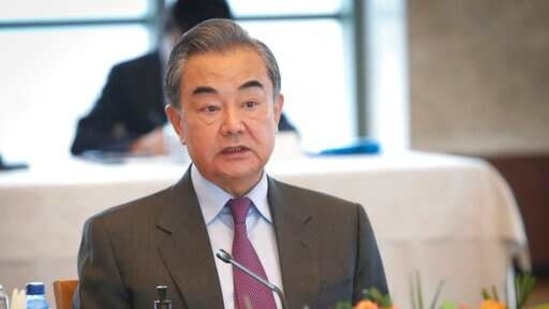 China's Foreign Minister Wang Yi warned Japan against getting caught between US-China confrontation. (AP) China's Foreign Minister Wang Yi warned Japan against getting caught between US-China confrontation. (AP)