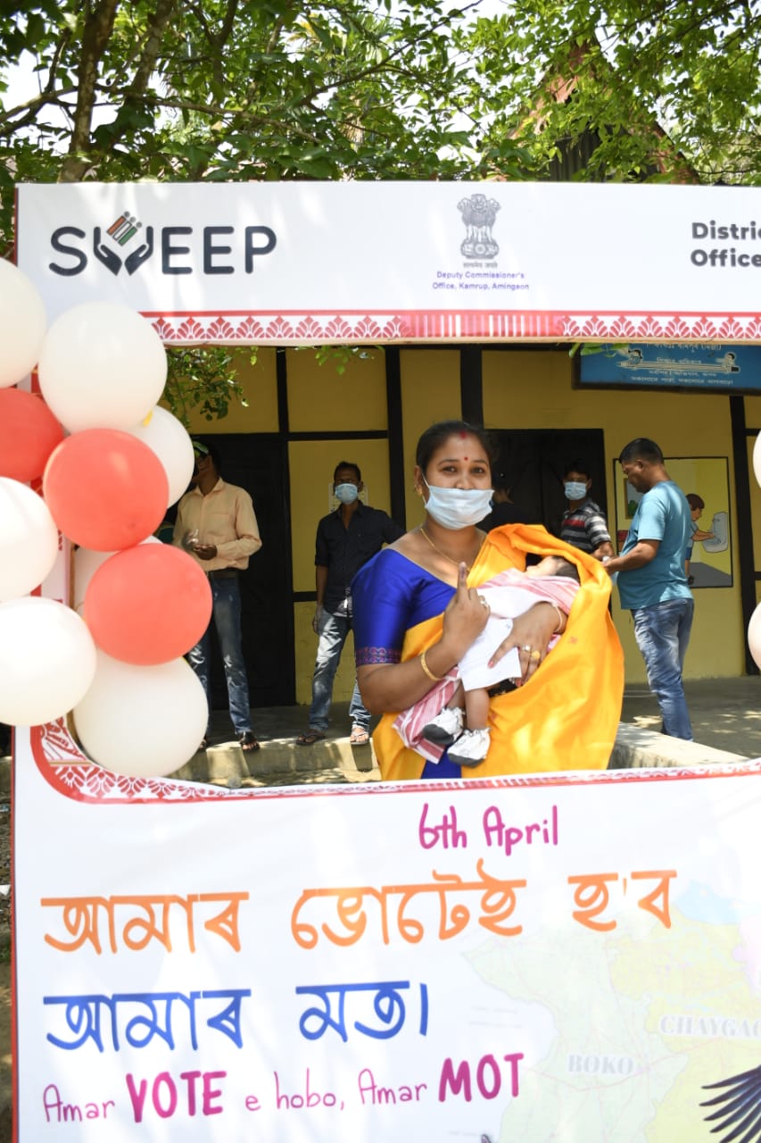 A voter with her new-born baby during the polling process for the Assam assembly elections.  (CEO Assam Twitter)