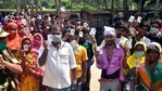 Voters show their voter-ID card as they arrive to cast their vote during the second phase of the West Bengal Assembly election at Nandigram. (ANI Photo) Voters show their voter-ID card as they arrive to cast their vote during the second phase of the West Bengal Assembly election at Nandigram. (ANI Photo)