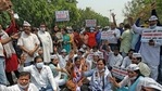 AAP workers shout slogans during a protest against the central government outside BJP HQ in New Delhi on April 7, 2021. (ANI Photo) AAP workers shout slogans during a protest against the central government outside BJP HQ in New Delhi on April 7, 2021. (ANI Photo)