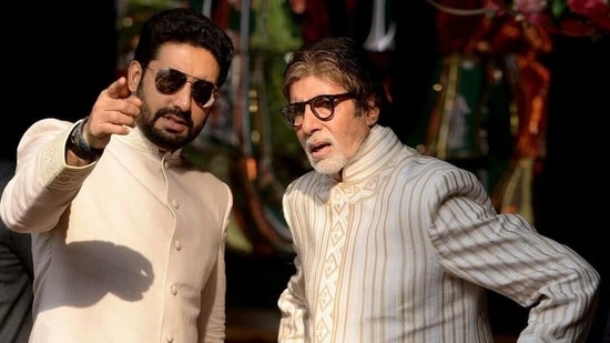 Amitabh Bachchan and Abhishek Bachchan caught in a candid moment. Amitabh Bachchan and Abhishek Bachchan caught in a candid moment.