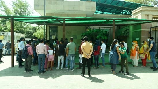 Administration officials appealed to the residents to collectively support the government's surveillance and contact tracing efforts. In picture - People queue to register for coronavirus tests at Sector 30 District Hospital in Noida. (HT Photo) Administration officials appealed to the residents to collectively support the government's surveillance and contact tracing efforts. In picture - People queue to register for coronavirus tests at Sector 30 District Hospital in Noida. (HT Photo)