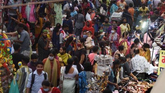 Heavy rush of shoppers at a weekly market with some people not wearing face masks, in Pandav Nagar, New Delhi, India, on Wednesday, April 7, 2021. (Photo by Raj K Raj/ Hindustan Times) Heavy rush of shoppers at a weekly market with some people not wearing face masks, in Pandav Nagar, New Delhi, India, on Wednesday, April 7, 2021. (Photo by Raj K Raj/ Hindustan Times)