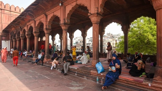 People visiting Jama Masjid, with many not wearing face masks, in New Delhi on April 6. The night curfew is the first restriction imposed by the government in the Capital, where the rate of new cases has jumped 130% in just the past week.(Amal KS / Hindustan Times)