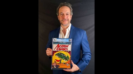 This photo provided by Metropolis Collectibles shows Vincent Zurzolo, co-owner of ComicConnect, holding Action Comics first edition 1938 comic book marking Superman's first appearance.(AP) This photo provided by Metropolis Collectibles shows Vincent Zurzolo, co-owner of ComicConnect, holding Action Comics first edition 1938 comic book marking Superman's first appearance.(AP)