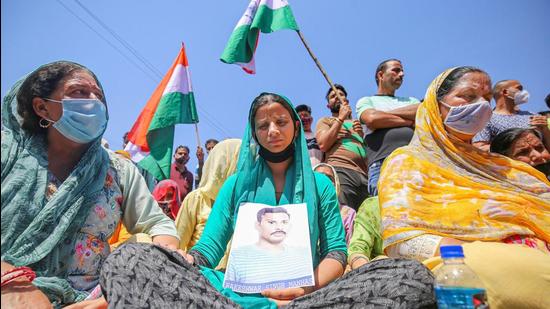 Jammu: Wife of CRPF Commando Rakeshwar Singh Manhas during a protest, demanding his release from the captivity of Maoists in Jammu, Wednesday, April 7, 2021. (PTI)