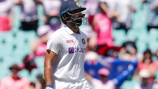 India's Hanuma Vihari walks from the field after he was run out for four runs during play on day three of the third cricket test between India and Australia at the Sydney Cricket Ground, Sydney, Australia, Saturday, Jan. 9, 2021. (AP Photo/Rick Rycroft)(AP)