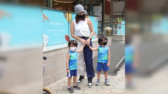 The mother-of-three wore a basic white sleeveless top for her day out with the kids.(Varinder Chawla)