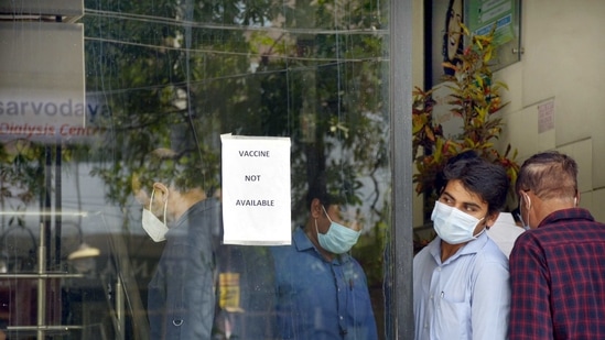 A public notice notifying shortage of vaccines, at a centre.