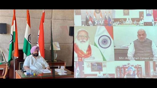 Chief minister Capt Amarinder Singh speaking during the virtual meeting of the national committee, chaired by Prime Minister Narendra Modi, on Thursday. Union home minister Amit Shah and defence minister Rajnath Singh besides former PM Manmohan Singh attended the discussion. (HT Photo) Chief minister Capt Amarinder Singh speaking during the virtual meeting of the national committee, chaired by Prime Minister Narendra Modi, on Thursday. Union home minister Amit Shah and defence minister Rajnath Singh besides former PM Manmohan Singh attended the discussion. (HT Photo)