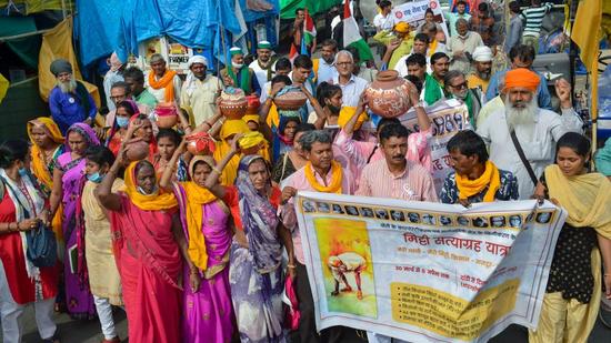 Mud Satyagraha Yatra activists arrive at farmers' protest site at Ghazipur border, in New Delhi. (PTI) Mud Satyagraha Yatra activists arrive at farmers' protest site at Ghazipur border, in New Delhi. (PTI)