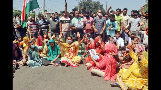 Locals and family members of CRPF jawan Rakeshwar Singh Manhas block the Jammu-Akhnoor highway demanding his release, in Jammu on Wednesday, April 7. (ANI) Locals and family members of CRPF jawan Rakeshwar Singh Manhas block the Jammu-Akhnoor highway demanding his release, in Jammu on Wednesday, April 7. (ANI)