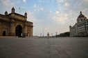 A policewoman walks through a deserted area between the Gateway of India and Taj Mahal Hotel ahead of the scheduled weekend lockdown imposed by the state government amidst rising Covid-19 coronavirus cases in Mumbai. (AFP) A policewoman walks through a deserted area between the Gateway of India and Taj Mahal Hotel ahead of the scheduled weekend lockdown imposed by the state government amidst rising Covid-19 coronavirus cases in Mumbai. (AFP)