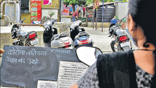 “No Covid-19 vaccination drive today” written on a notice board placed at Sane Guruji hospital, Hadapsar on Thursday. Many across the city were told at vaccination centres to come at a later date as stock is over. (Ravindra Joshi/HT PHOTO)