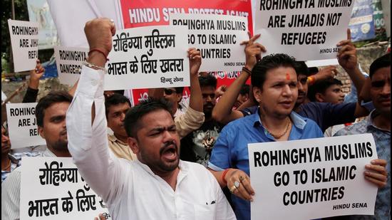 Members of Hindu Sena, a right wing Hindu group, hold placards as they shout slogans during a protest demanding deportation of Rohingya refugees from India, in New Delhi, in 2017. (REUTERS) Members of Hindu Sena, a right wing Hindu group, hold placards as they shout slogans during a protest demanding deportation of Rohingya refugees from India, in New Delhi, in 2017. (REUTERS)