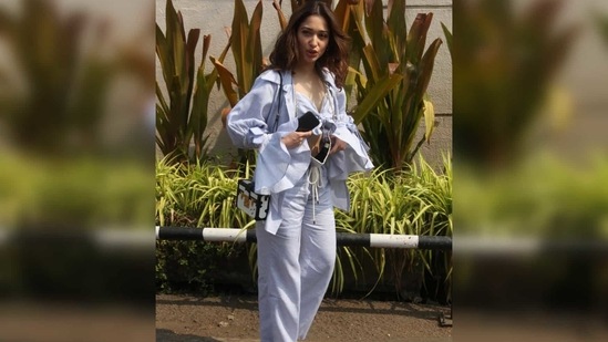 Tamannaah completed the co-ord set by wearing a matching shirt jacket on top that featured bell sleeves. (Varinder Chawla) Tamannaah completed the co-ord set by wearing a matching shirt jacket on top that featured bell sleeves. (Varinder Chawla)