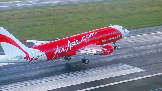A crew member of AirAsia somehow controlled the unruly passenger onboard with the help of co-passengers and informed the pilots about the unwanted incident. (File photo) A crew member of AirAsia somehow controlled the unruly passenger onboard with the help of co-passengers and informed the pilots about the unwanted incident. (File photo)