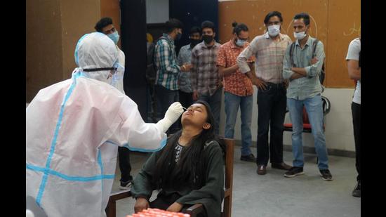 Students getting sampled for Covid test during a special camp at Government College of Art in Sector 10, Chandigarh,on Friday. (Ravi Kumar/HT)
