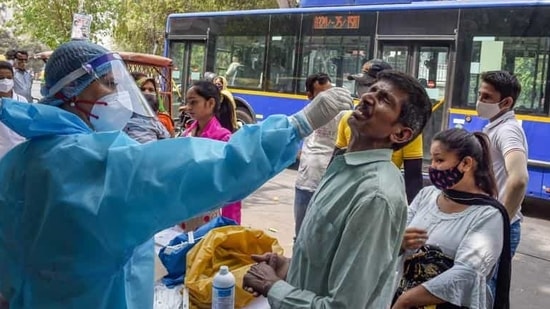 The last time Delhi saw as many cases was at the peak of the third and worst surge of cases in November. (PTI Photo) The last time Delhi saw as many cases was at the peak of the third and worst surge of cases in November. (PTI Photo)
