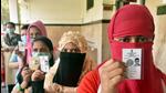 Female voters show voter Identity cards while standing in a queue to cast their vote during the 4th phase of West Bengal Assembly election. (ANI) Female voters show voter Identity cards while standing in a queue to cast their vote during the 4th phase of West Bengal Assembly election. (ANI)