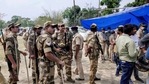 Security personnel are seen at a polling booth in Sitalkuchi of West Bengal's Cooch Behar district during the fourth phase of polling. (PTI)