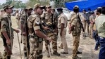Security personnel are seen at a polling booth in Sitalkuchi of West Bengal's Cooch Behar district during the fourth phase of polling.(PTI Photo)