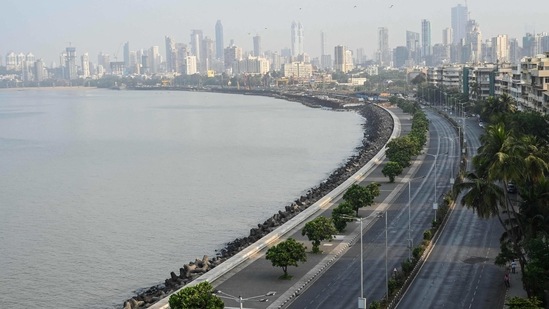 Deserted roads are seen on Marine Drive during the weekend lockdown imposed by the state government amidst rising Covid-19 coronavirus cases in Mumbai on April 10. Chief minister (CM) Uddhav Thackeray has called an all-party meeting in the evening where the proposal is likely to be discussed in detail.(Punit Paranjpe/AFP)