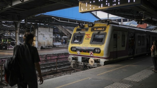 A train on a platform at the Dadar railway station on the first day of the weekend lockdown in Mumbai on April 10. After a nationwide lockdown a year ago caused widespread hardships and one of the sharpest downturns of any major economy, the central and state governments are desperate to avoid a second shutdown.(Dhiraj Singh/Bloomberg)
