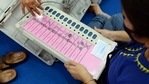 An EVM and its accessories with polling officials a day before the fourth phase of West Bengal assembly elections in Kolkata on Friday. (ANI / File Photo) An EVM and its accessories with polling officials a day before the fourth phase of West Bengal assembly elections in Kolkata on Friday. (ANI / File Photo)