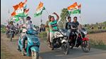 Trinamool Congress supporters take out a motorcycle rally during a campaign for the West Bengal assembly polls at Gargaria in Birbhum district on Sunday. (PTI PHOTO.)