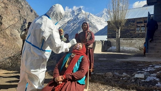 A healthcare worker gets a sample of a swab for the COVID-19 test, in Lahaul Spiti. (ANI) A healthcare worker gets a sample of a swab for the COVID-19 test, in Lahaul Spiti. (ANI)